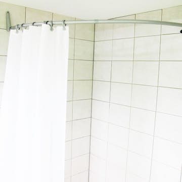 Duschstång Ericsindustrier Rundad för Hörn
