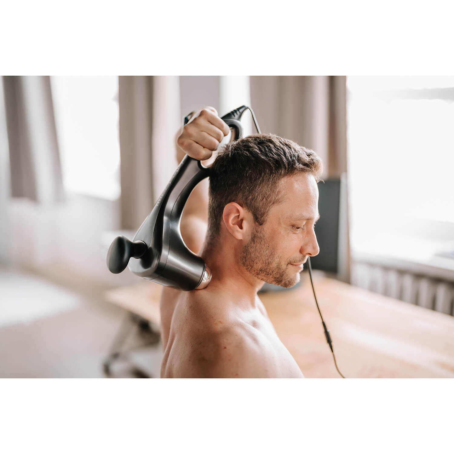 Handhållen MEDIVON Massageapparat Libra Pro.