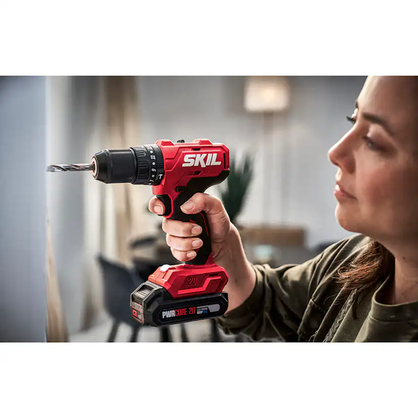 Skruvdragare SKIL 3021HC Batteridriven Kolborstfri med Slagborr och 100 Tillbehör