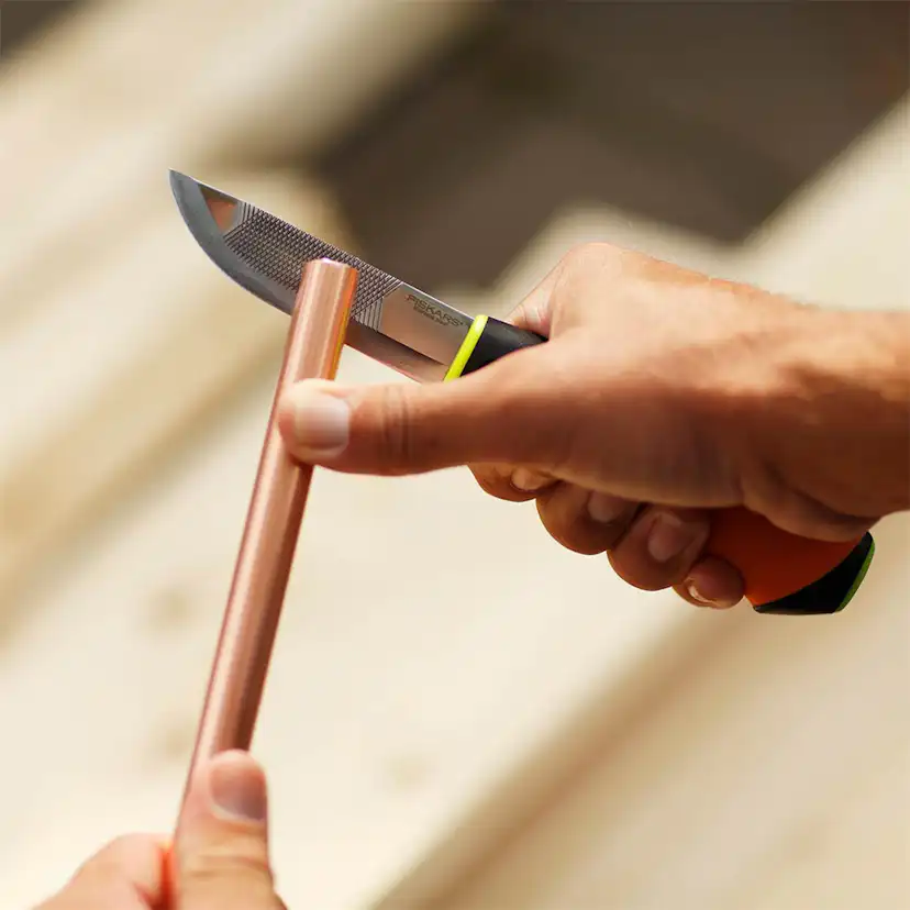 Grovkniv Fiskars Inbyggd Slip
